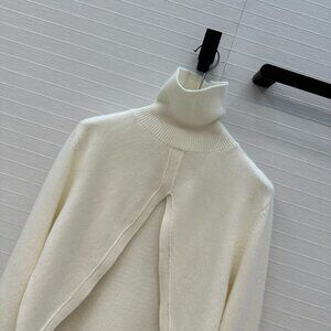 Alaia new triangle-cut wool knit cover-up